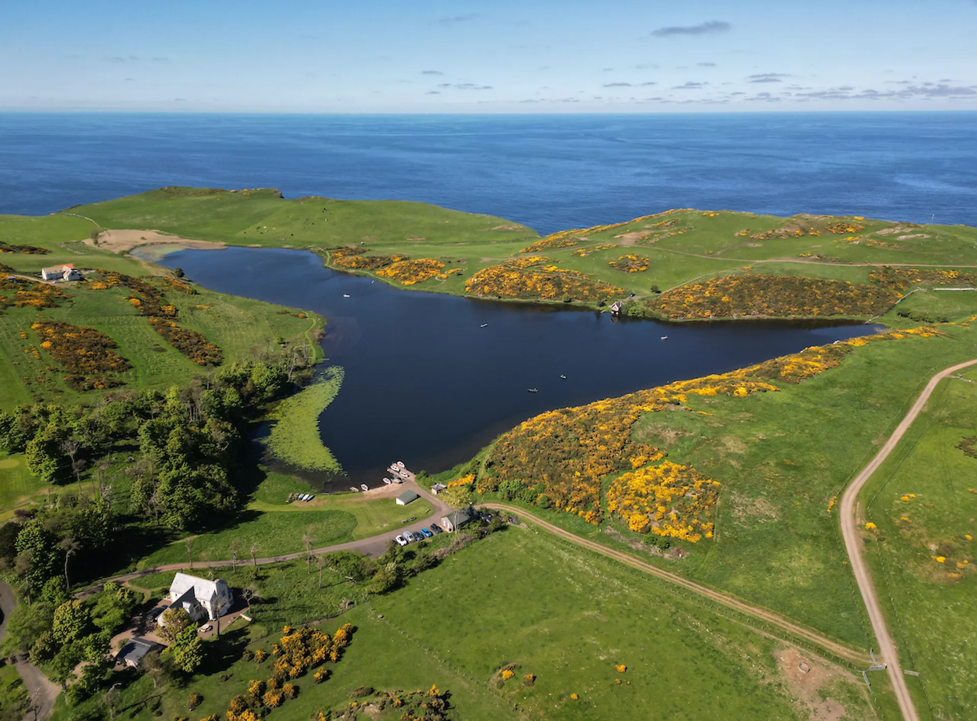 https://mr2.homeflow-assets.co.uk/files/media/image/0000/0000/14580d4652de90c307ef3e88097bc18b/ColdinghamLoch-DRONE-014.jpg