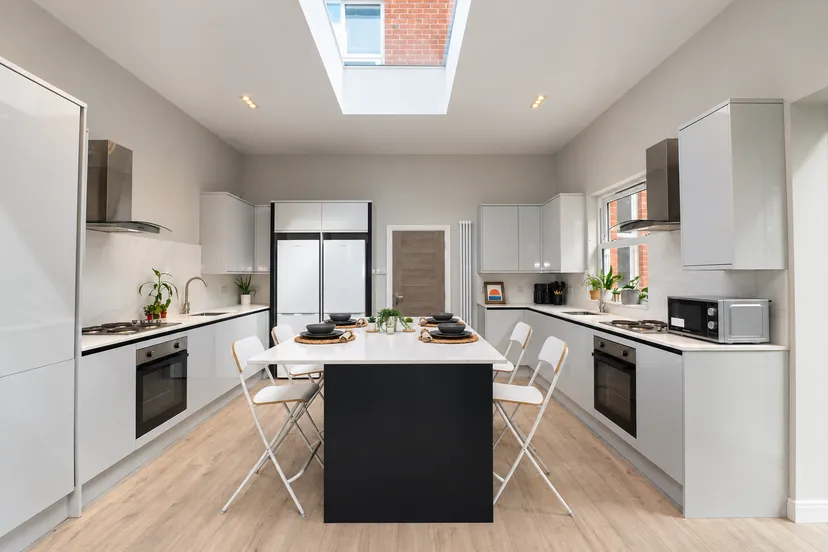 Symmetrical-Modern-Kitchen-with-Skylight.png