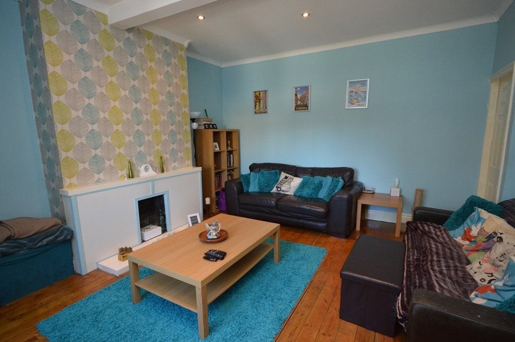 property for sale in Horsforth, living area, blue decor, spacious lounge