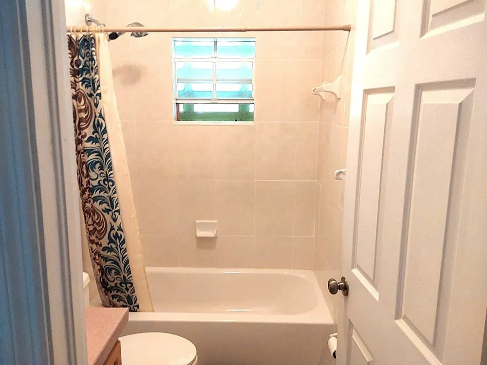 4bd/2ba house with an additional 10,000 sq ft. lot located in Scrub Hill, Long Island, Bahamas Long Island