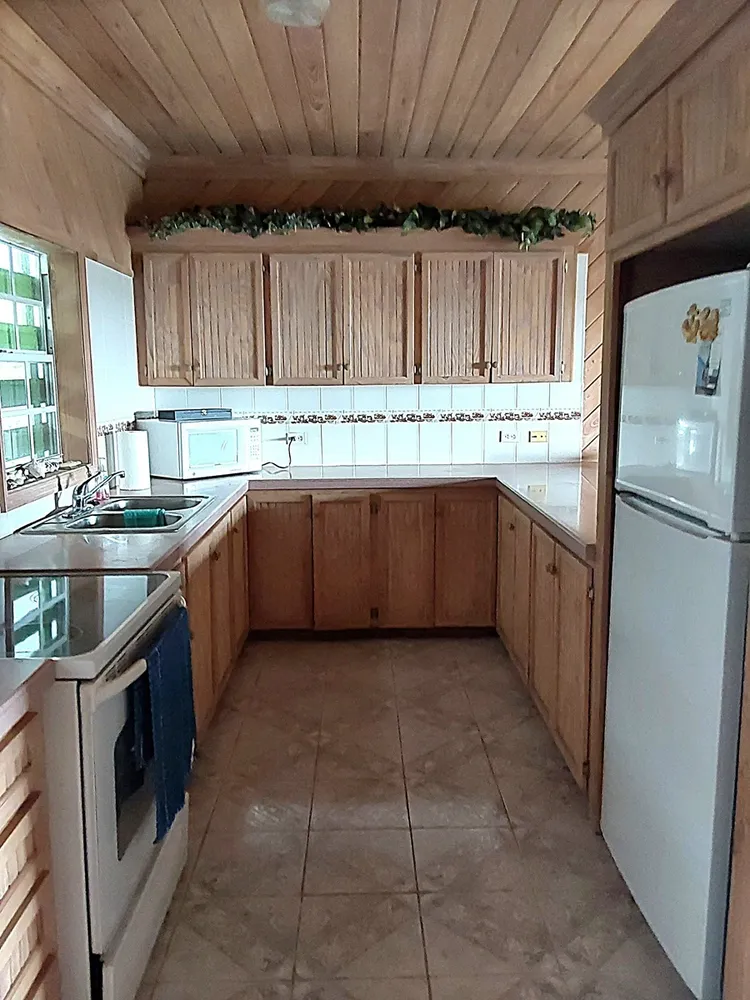 4bd/2ba house with an additional 10,000 sq ft. lot located in Scrub Hill, Long Island, Bahamas Long Island