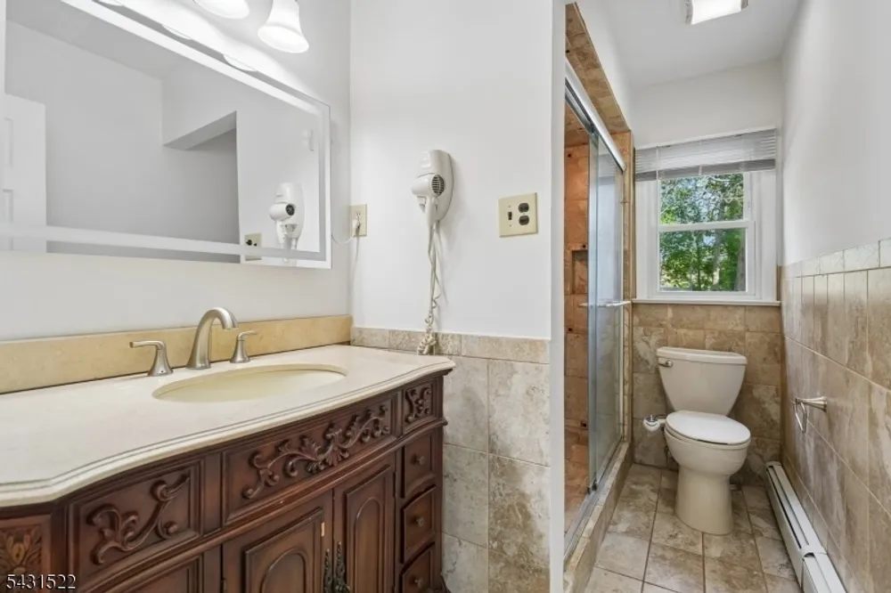 22 Spier Dr, Livingston, NJ 07039