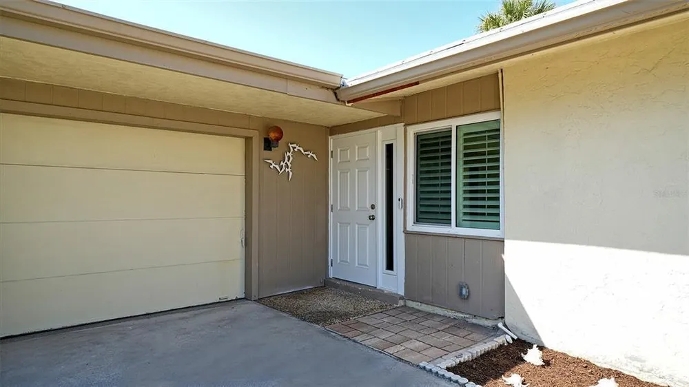 113 Whispering Sands Dr, Sarasota, FL 34242