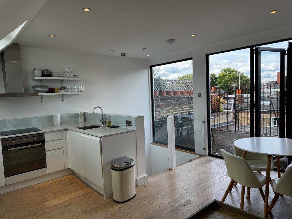 Flat 4, Comeragh Road, London Image 11