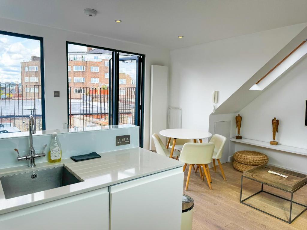 Flat 4, Comeragh Road, London Image 13