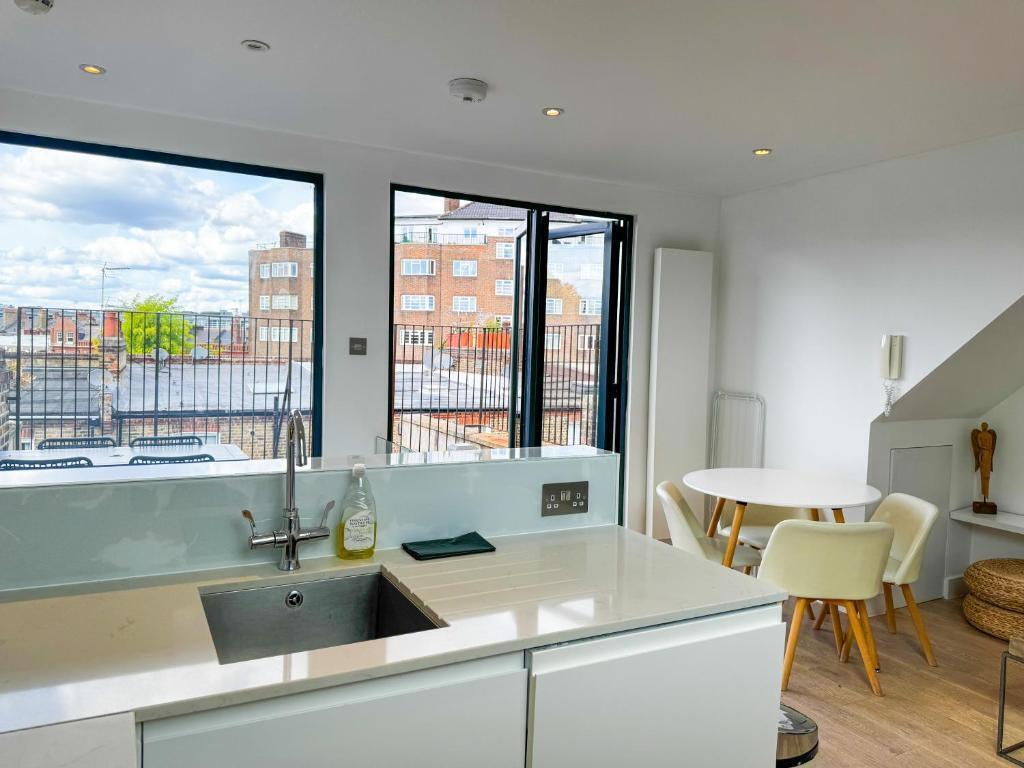 Flat 4, Comeragh Road, London Image 15
