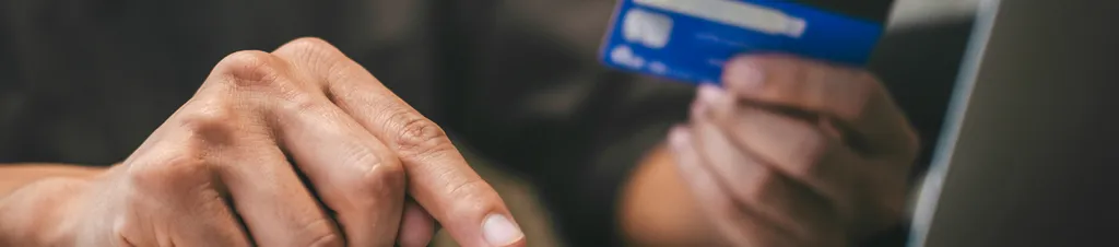 Banner image of someone paying a deposit online