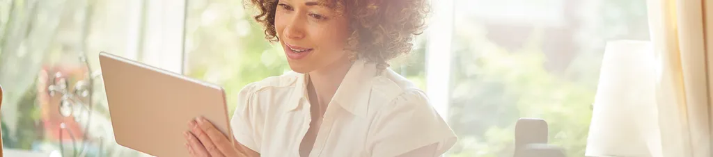 Banner image of a person doing ID checks online