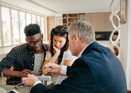 Image of people discussing a mortgage